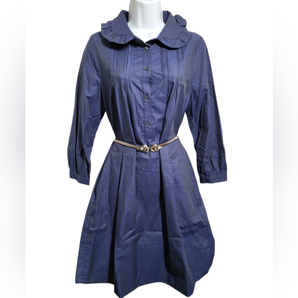Anecdote Elegant  blue tunic dress features a stylish design,